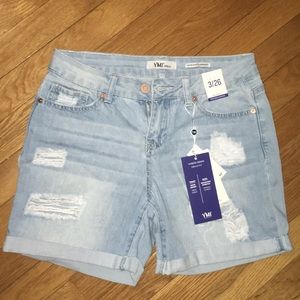 Women’s light washed distressed denim shorts